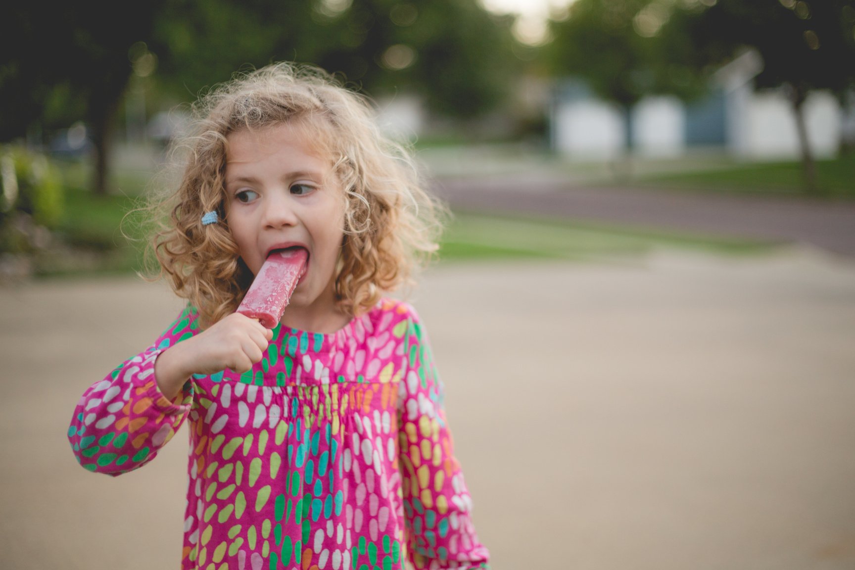 Girl Eating Popsicle